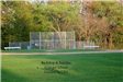 Backstop and benches at the Granger School