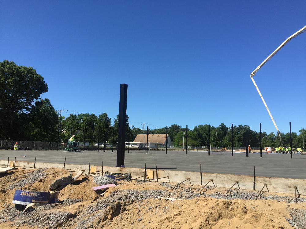 New concrete being leveled